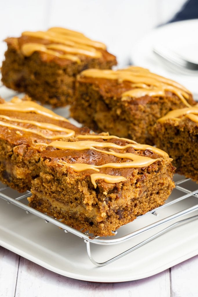 Sticky Toffee Brownie decorated in caramel sauce on an oven rack