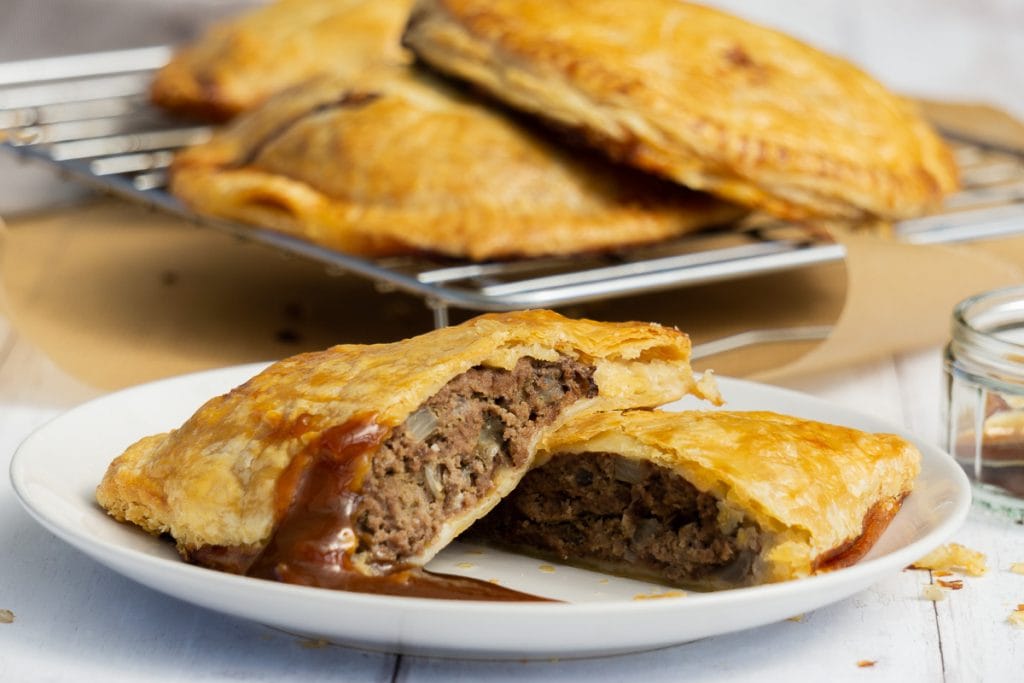 Forfar Bridie on a plate with brown sauce