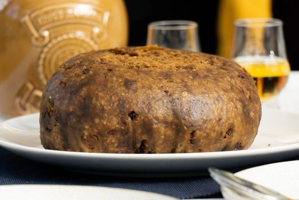 A clootie dumpling on a plate