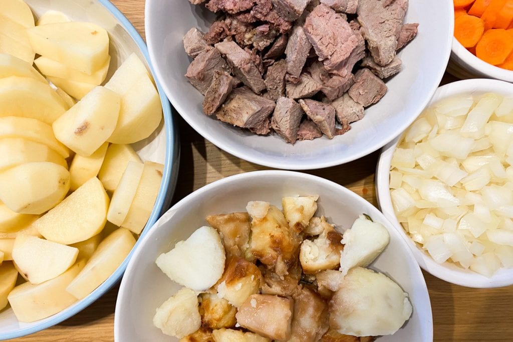 Ingredients for Stovies Recipe - Roast meat, roast potatos, chopped potatoes, chopped onion, chopped carrot