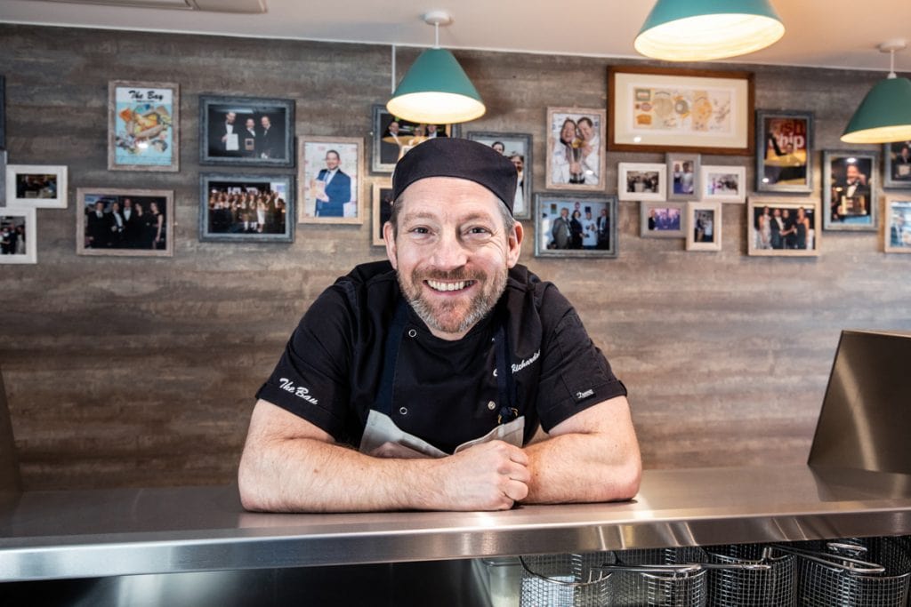 The Bay Fish and Chips Scotland - Calum inside the shop